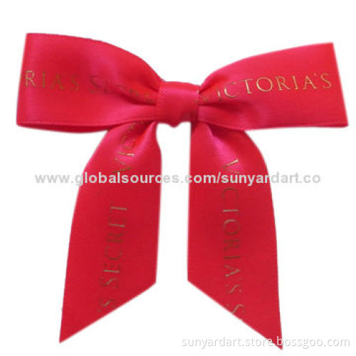 Pre-tied bow made of polyester ribbon with hot stamped logoNew